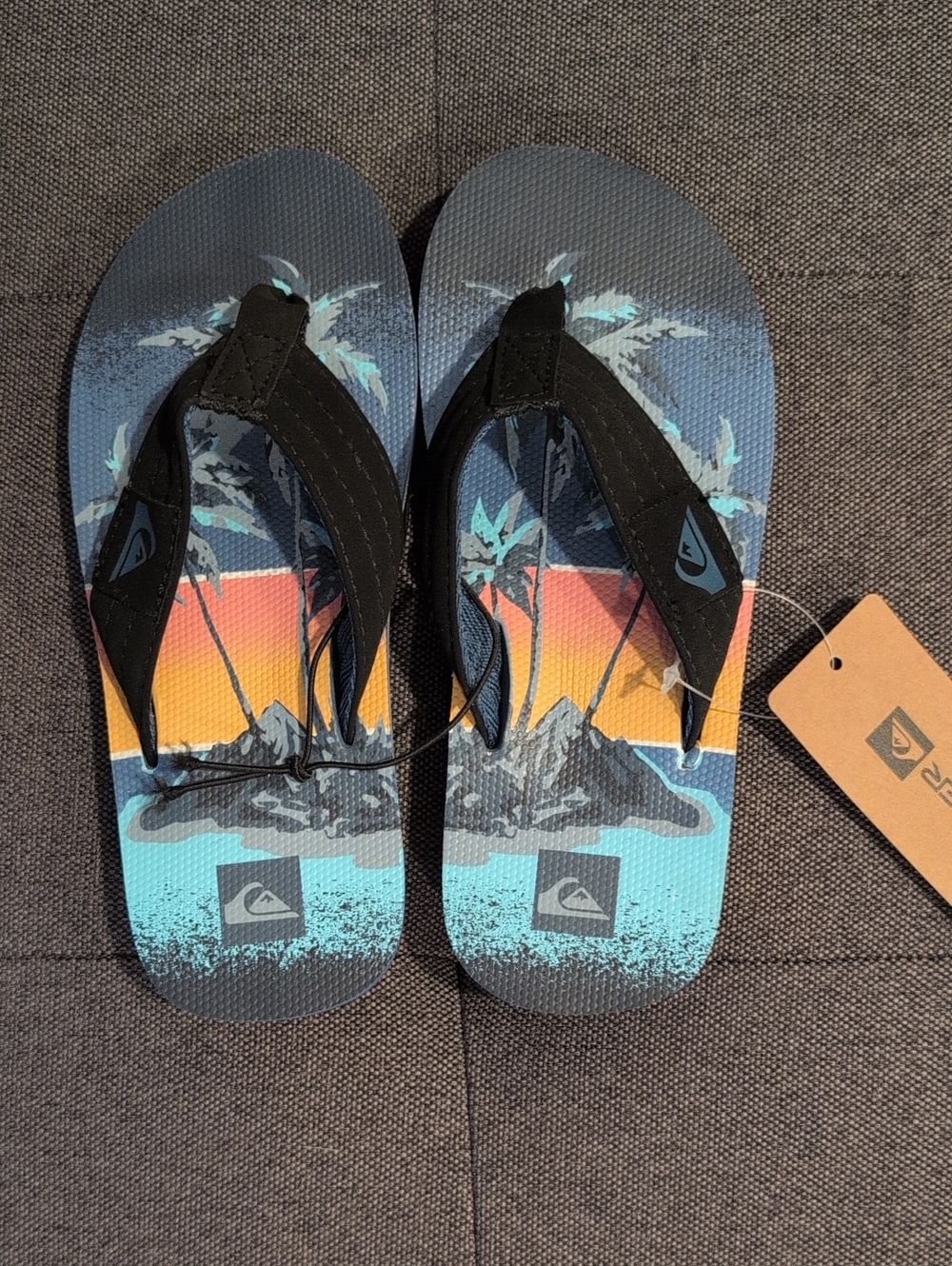 Quiksilver Boys' Black Strapped Flip Flops with Blue and Orange Sunset Print
